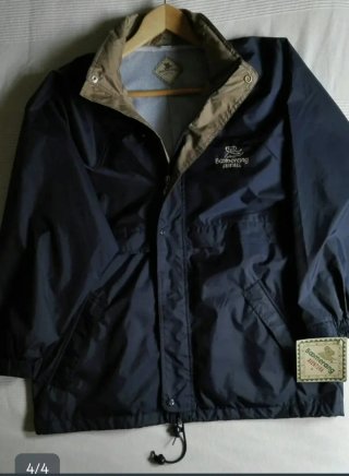 Conjunto de chubasquero y pantalón impermeable