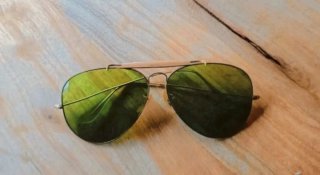 Gafas de sol Ray Ban USA doradas y verdes