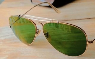 Gafas de sol Ray Ban USA doradas y verdes