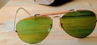 Gafas de sol Ray Ban USA doradas y verdes