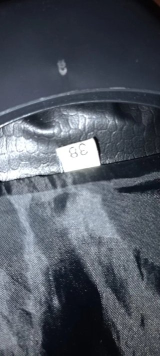 Chaqueta negra efecto piel
