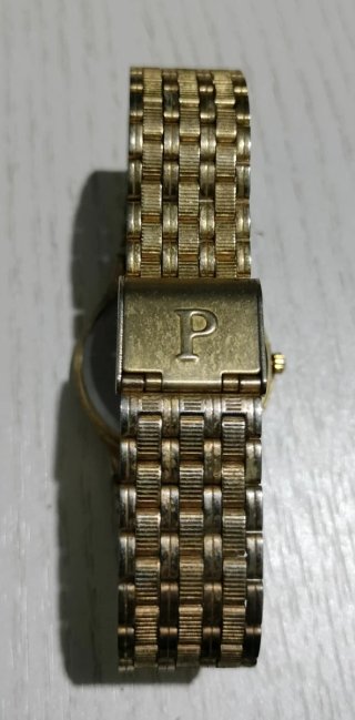 Reloj Potencias Dorado