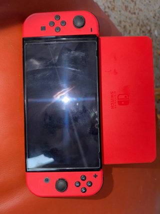 Nintendo Switch Rossa + 3 Giochi + Custodia