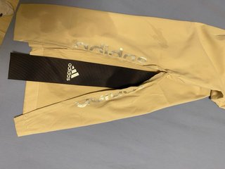 Pantalón impermeable Adidas beige mujer