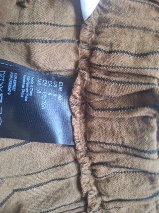 Pantalón corto de lino con rayas