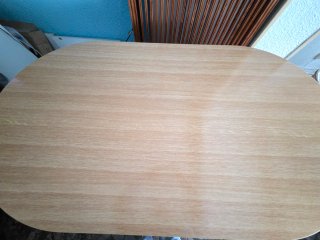 Mesa de comedor ovalada de madera