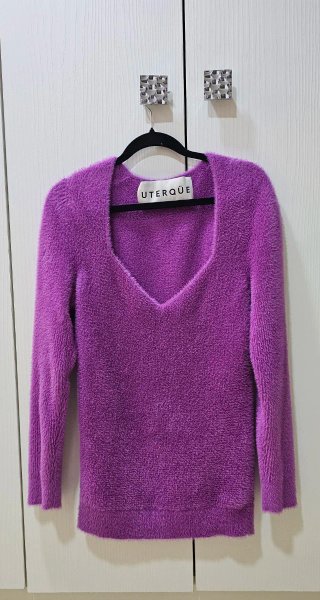 Jersey Uterqüe rosa peluche escote pico