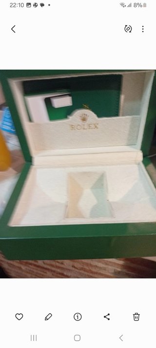 Reloj Rolex con su caja y sus papeles originales