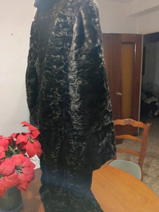 Abrigo de garras casi sin usar
