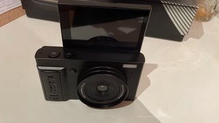 Cámara digital abdoriginal negra