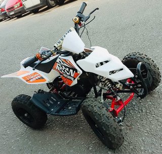 Quad ROAN infantil naranja y blanco
