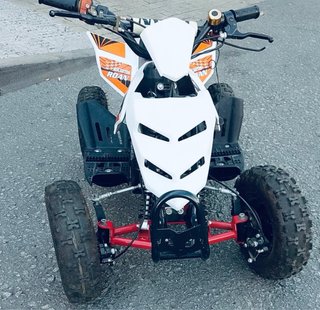 Quad ROAN infantil naranja y blanco