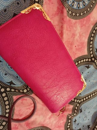 Bolso de mano rosa fucsia elegante