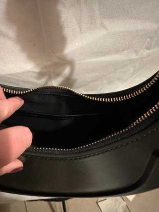 Borsa nera con manico rigido