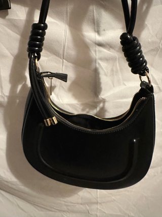 Borsa nera con manico rigido