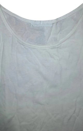 Blusa blanca volantes y bordado calado