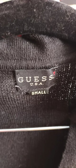 Blusa Guess sin manga cuello polo Talla S