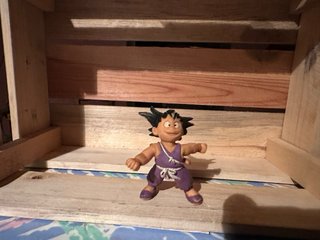 Figura de acción goku snoope  disney