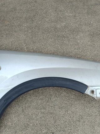 Guarda lamas direito opel corsa C