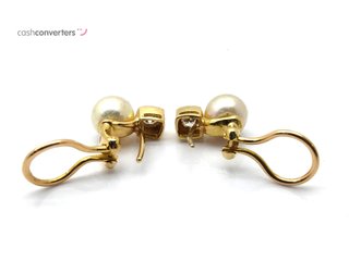 pendientes oro 18k con piedra con diamante,perla