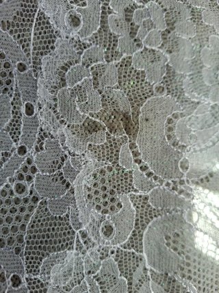Mantilla de encaje en última foto una pequeña tara