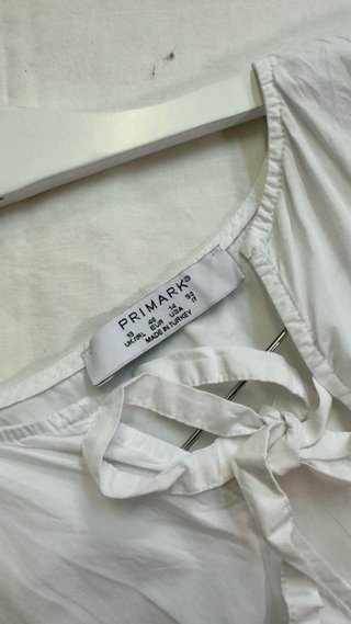 Blusa blanca lazos Primark T.46