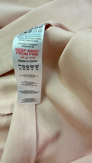 Top rosa palo halter espalda abierta