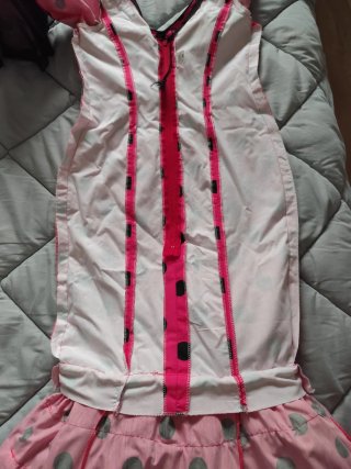Traje de flamenca rosa con lunares negros