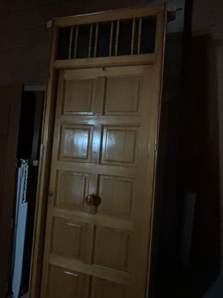 Puerta exterior madera.
