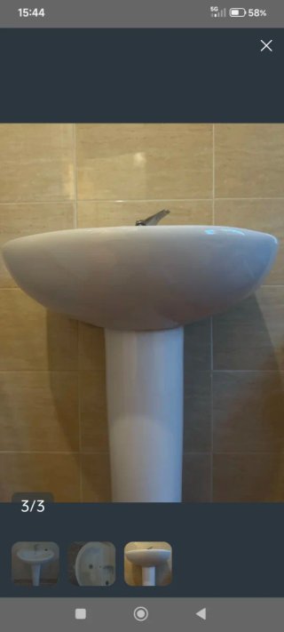 Lavabo redondo con grifería