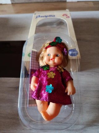 Muñeca Barriguitas con vestido floral