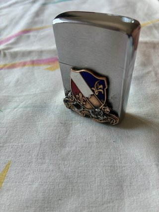 Zippo Vintage con stemma e scritte
