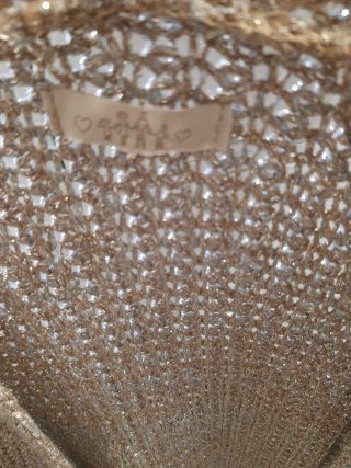 Cárdigan dorado brillante entretiempo