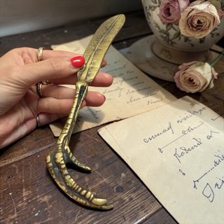 Apri lettere antico ottone artiglio piuma