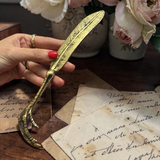 Apri lettere antico ottone artiglio piuma