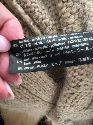 Chaqueta larga Zara beige trenzada