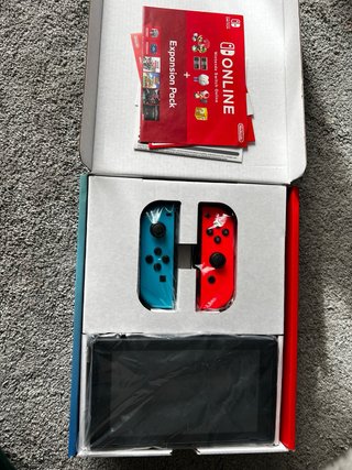 Nintendo Switch v2 + 3 giochi + accessori