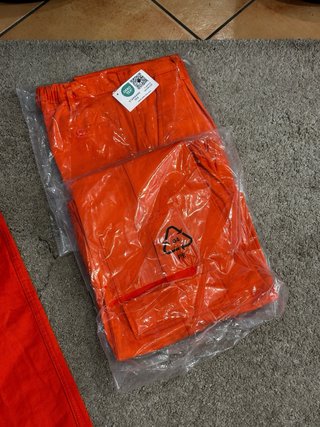 Set pantaloni da lavoro arancioni taglia 48