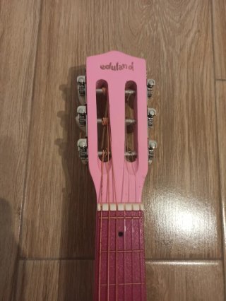 Guitarra infantil rosa