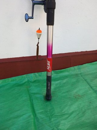 Caña de pesca con carrete
