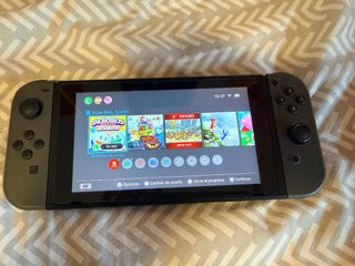 Nintendo Switch + Accessori + Custodia