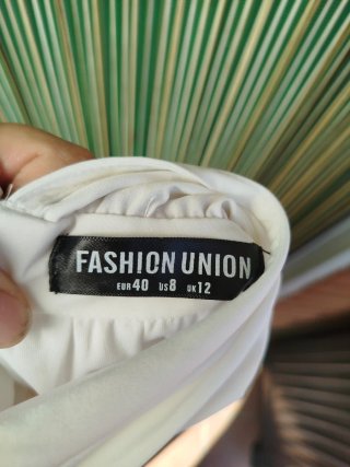 Mono floral blanco y rosa