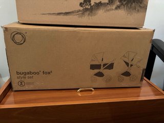 Bugaboo Fox 2 + funda lluvia + Bolso