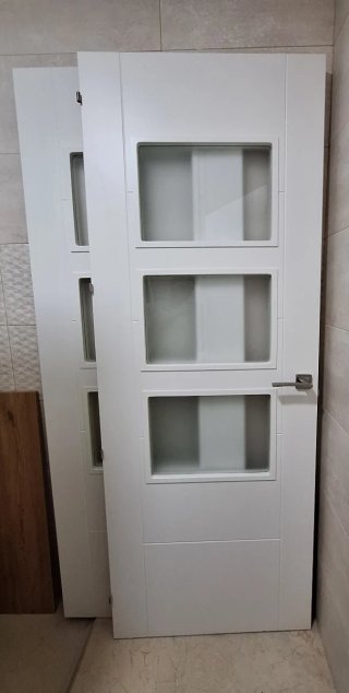 Pareja puertas blancas con cristal