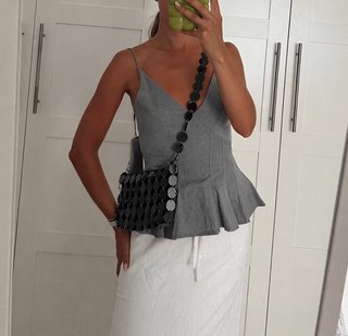 Bolso negro con círculos