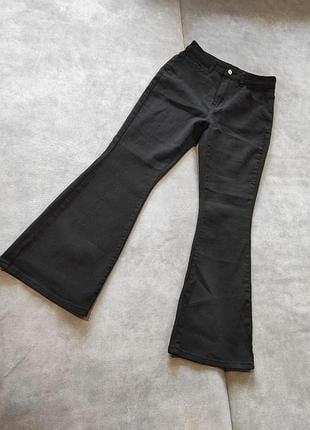 Pantalones vaqueros acampanados elásticos mujer
