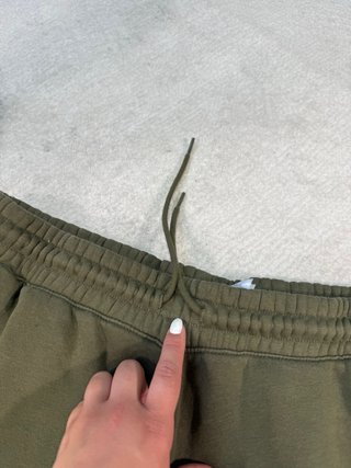 Pantalón chándal Reebok verde militar