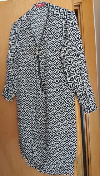 Túnica estampada geométrica cremallera