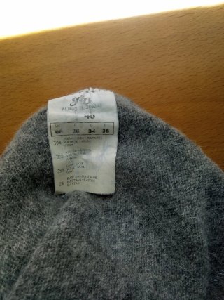 Jersey cuello alto gris mujer