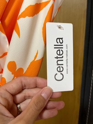 Vestido midi estampado naranja y blanco